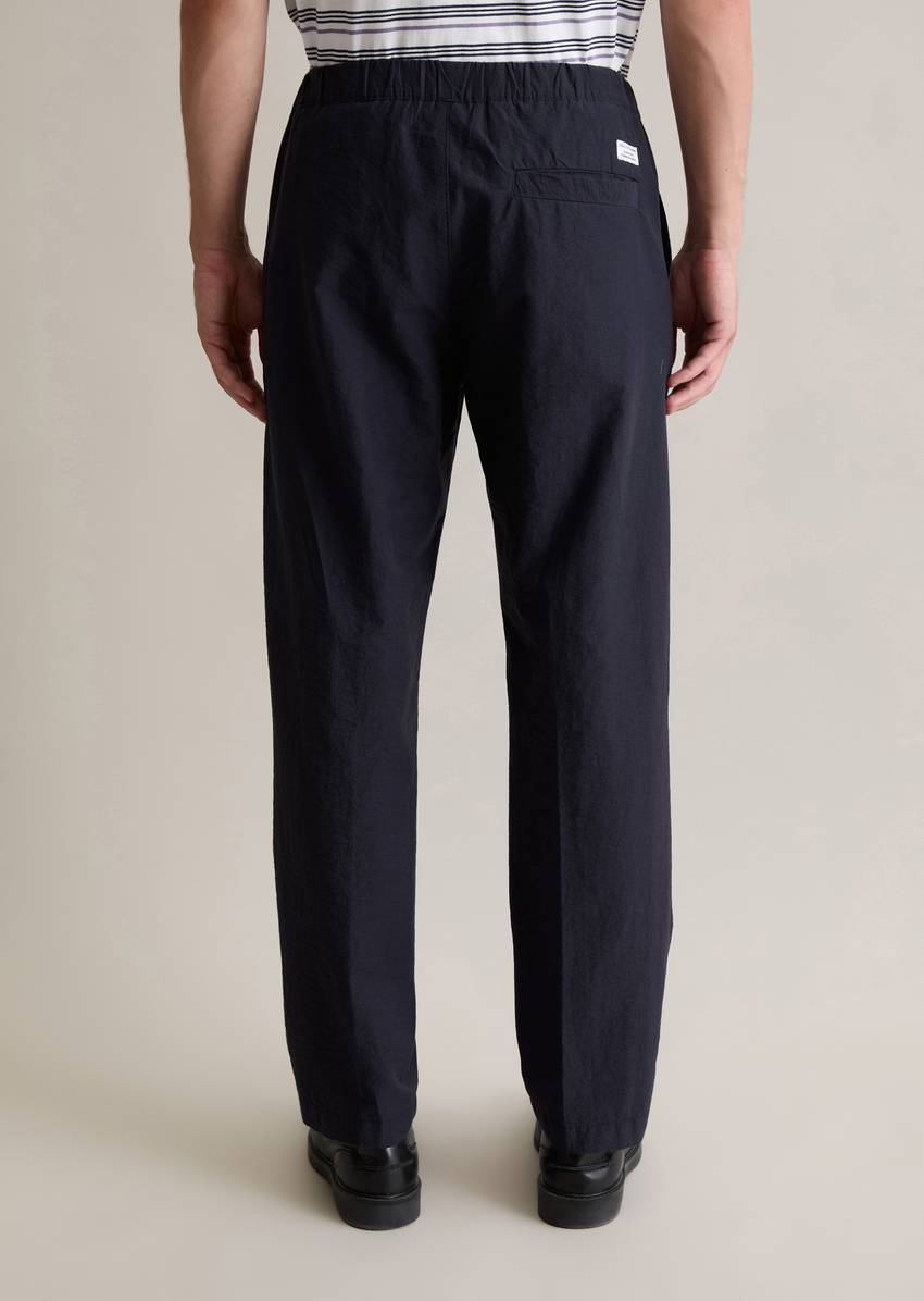Jogger regular trousers with a fine crinkle texture