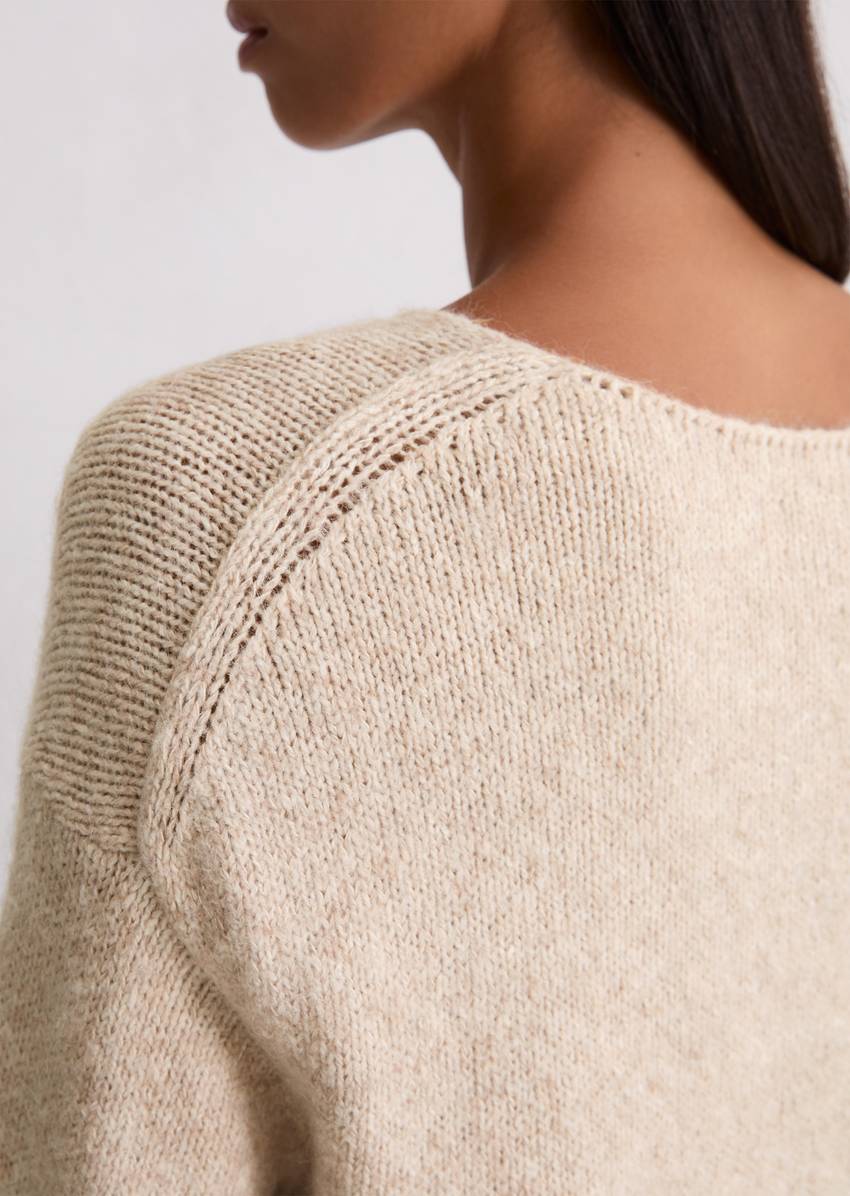 Sweater loose made from an organic cotton/alpaca/virgin wool mix