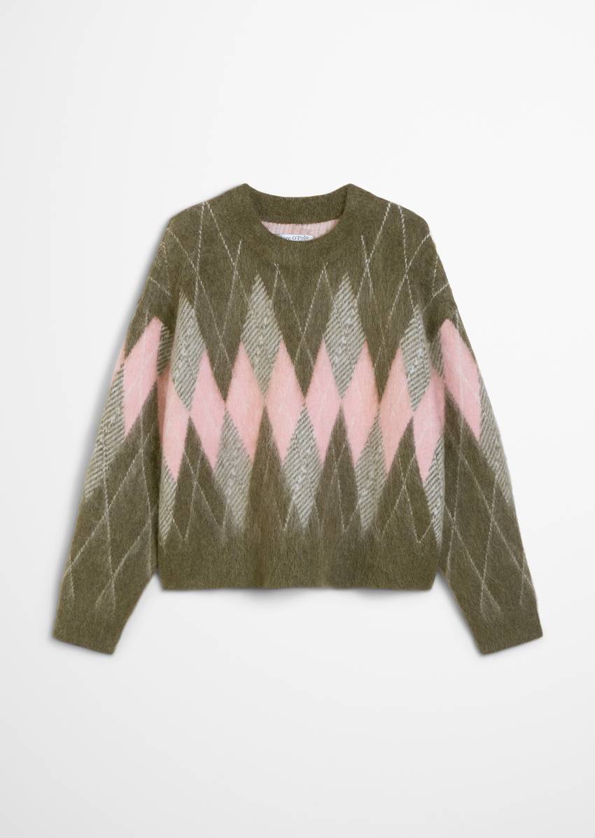 Relaxed knit sweater made from a cozy virgin wool and mohair blend