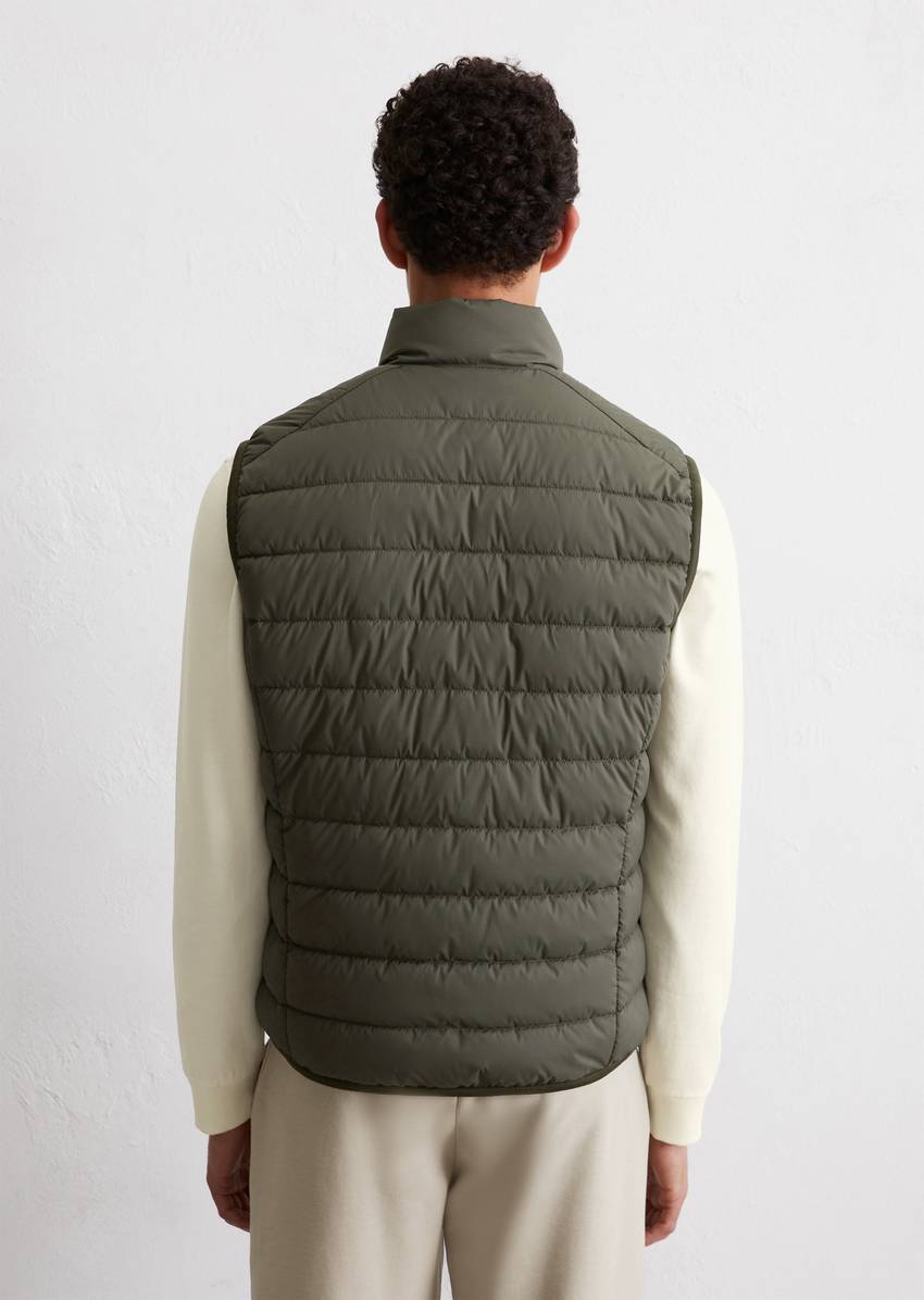 Regular quilted vest with practical pannier
