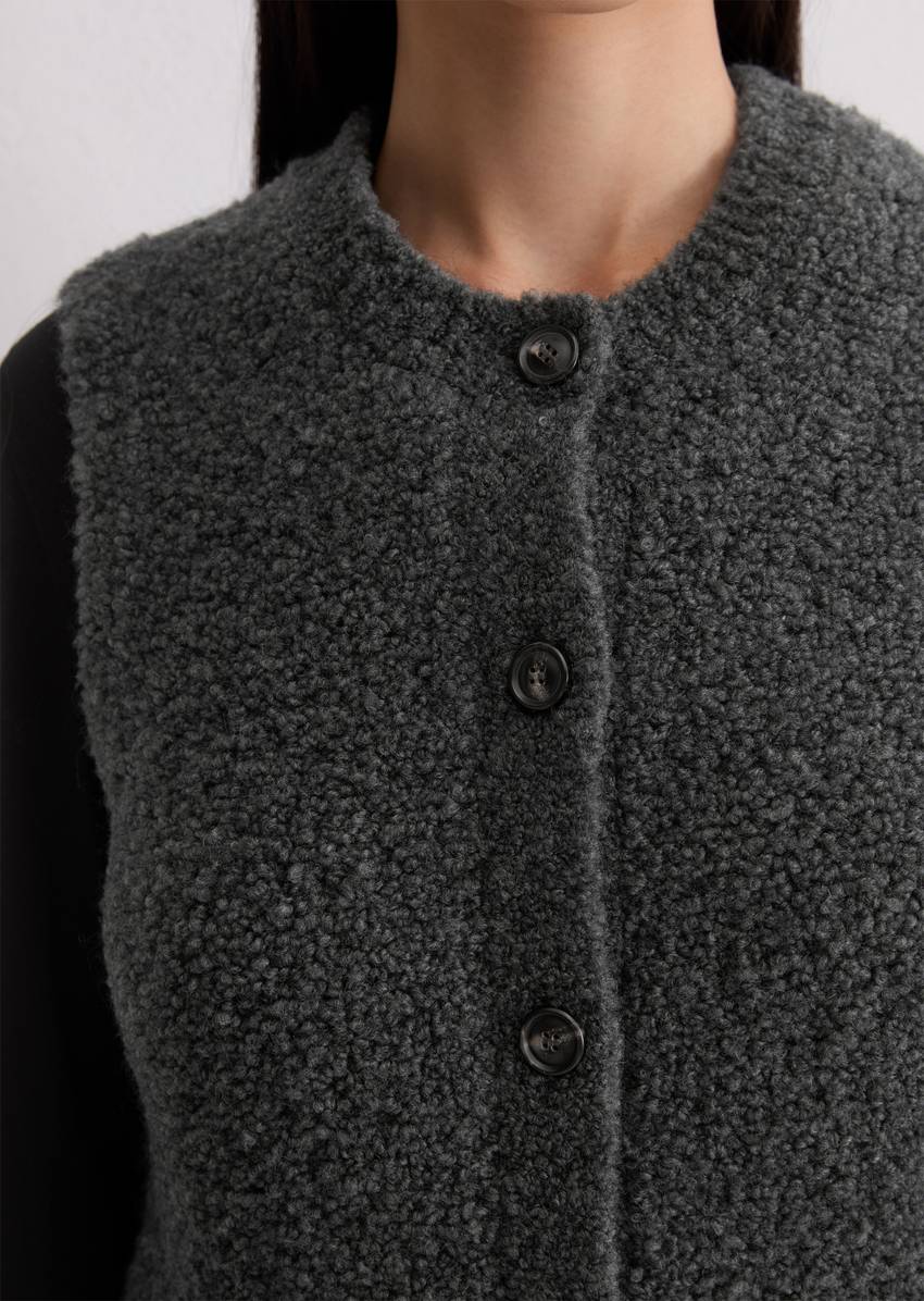 Regular sleeveless cardigan made from a wool/alpaca wool mix