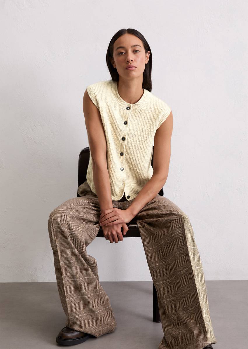 Sleeveless knitted vest regular made from bouclé yarn