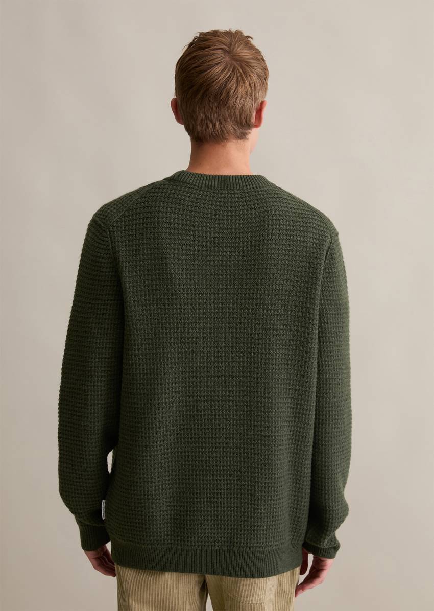 Wool sweater relaxed with a striking structure