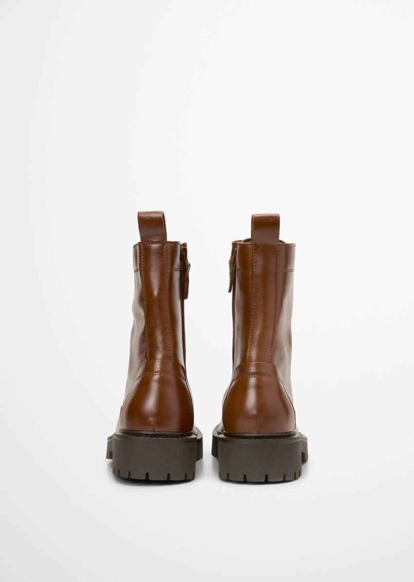 Lace-up boots with inside zipper