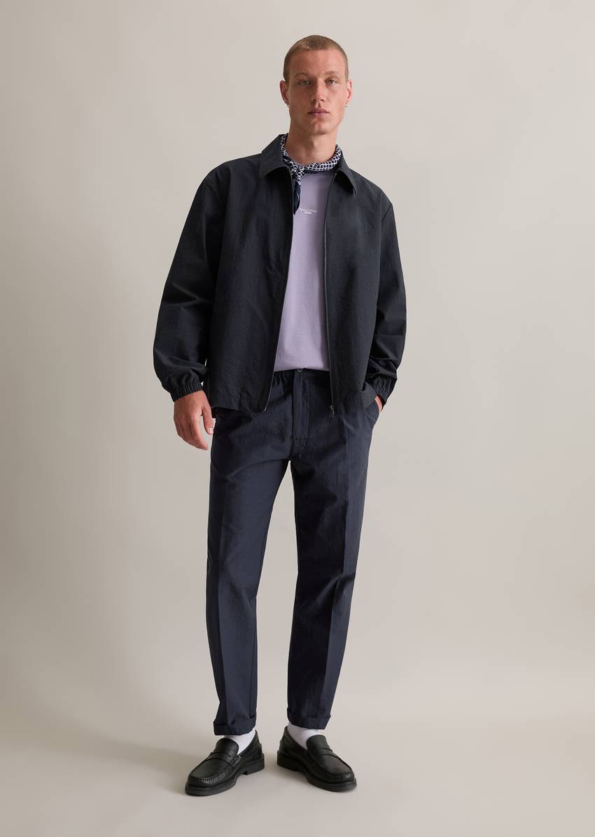 Coach jacket made from a textured organic cotton blend