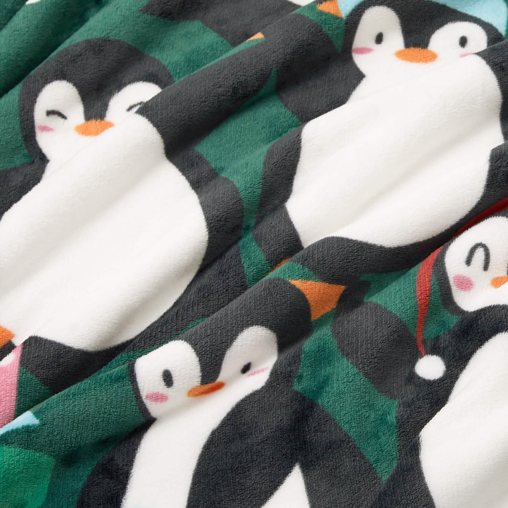 GentleSoft® Christmas Penguin Green Sherpa Throw Blanket
