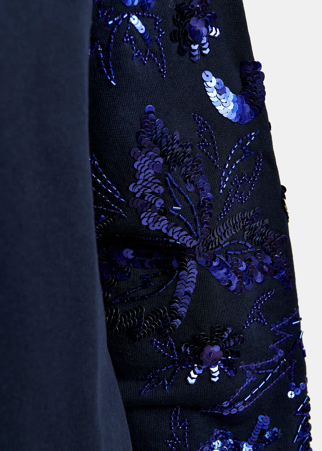 Navy blue organic cotton sweatshirt with sequin and bead-embroidered sleeves