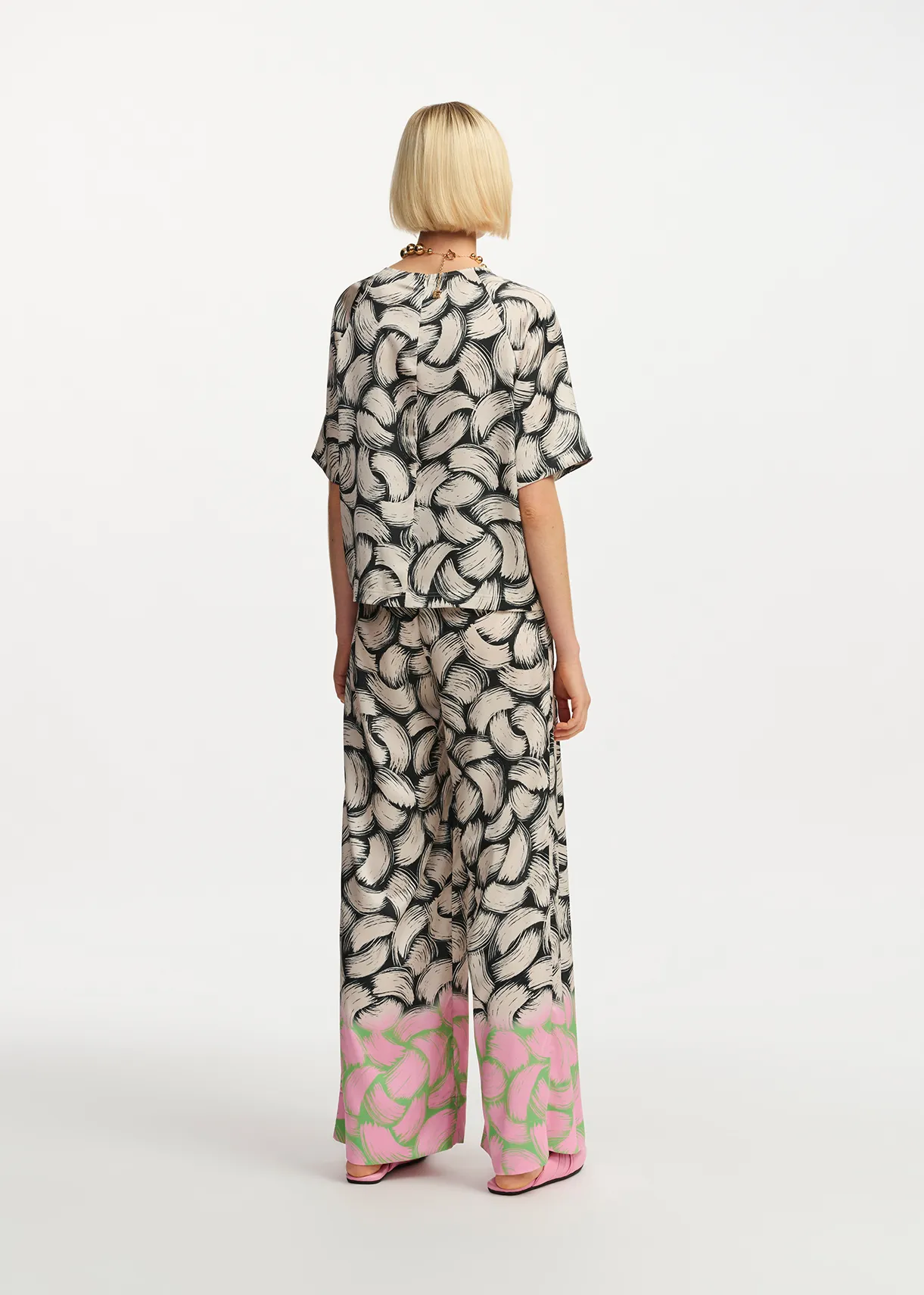 Black, off-white and pink abstract-print wide-leg pants