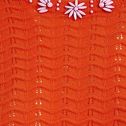 Red knit sweater with embellished neckline