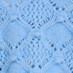 Blue cable-knit turtleneck sweater