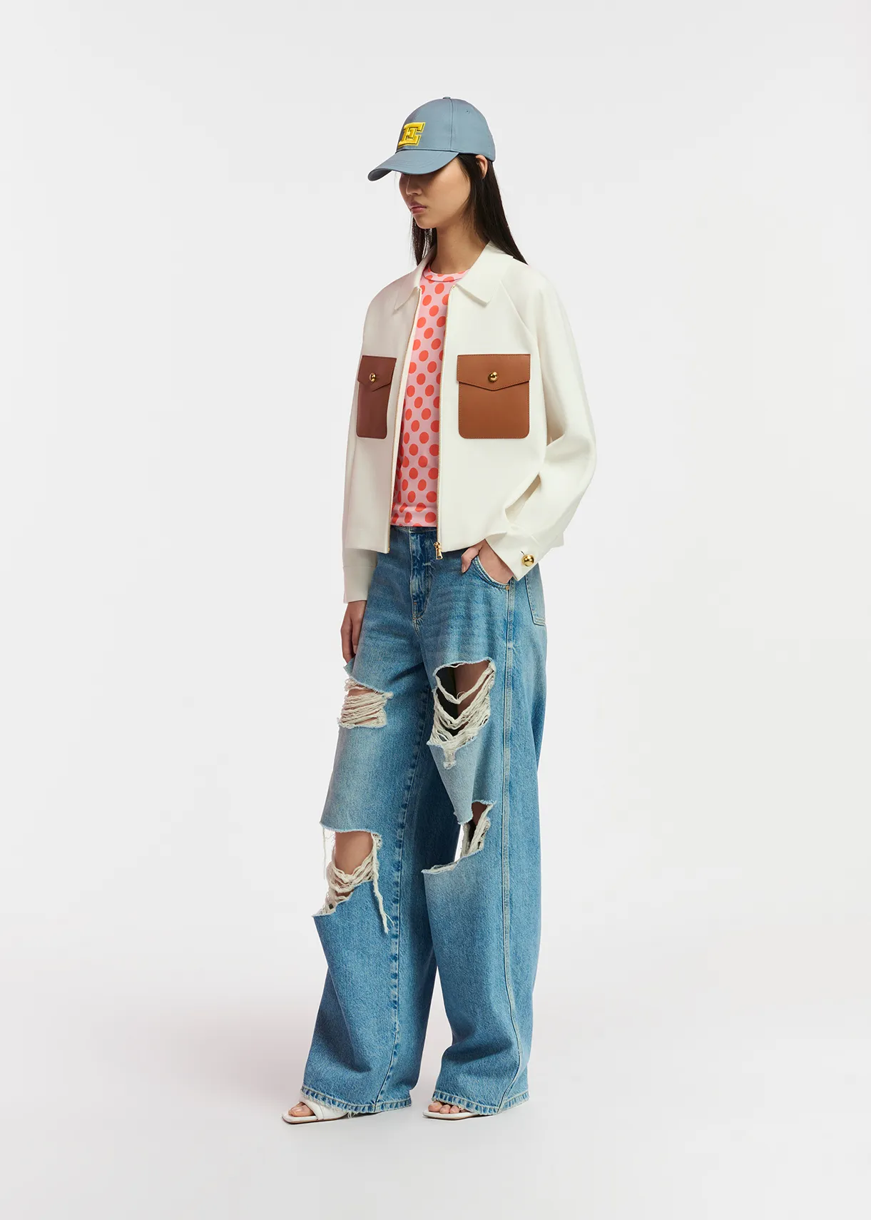 Off-white knitted jacket with faux leather patch pockets