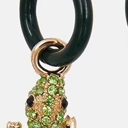 Black hoop earrings with crocodile and hot sauce pendants