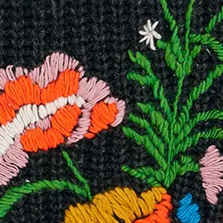 Dark grey rib-knitted sweater with floral embroideries