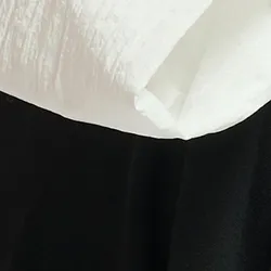 Black sweatshirt with white bow
