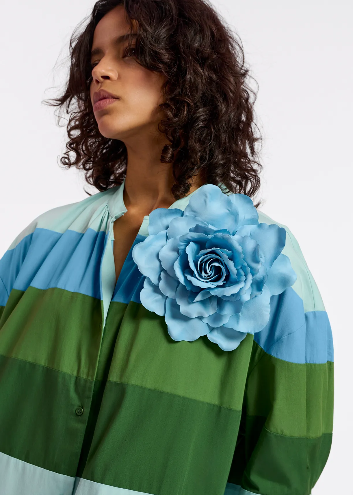 Blue flower-shaped brooch