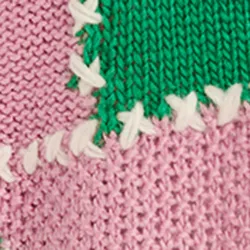 Green and light pink patchwork knit sweater