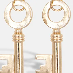 Gold-tone hoop earrings with key pendants