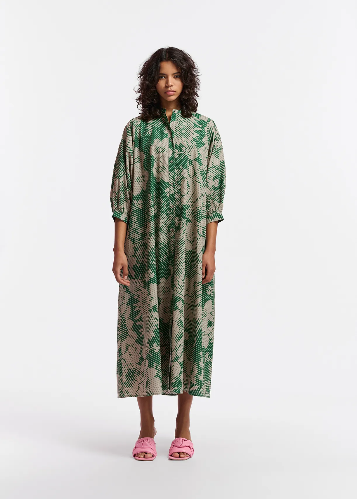 Beige and dark green maxi-length dress with geometric print