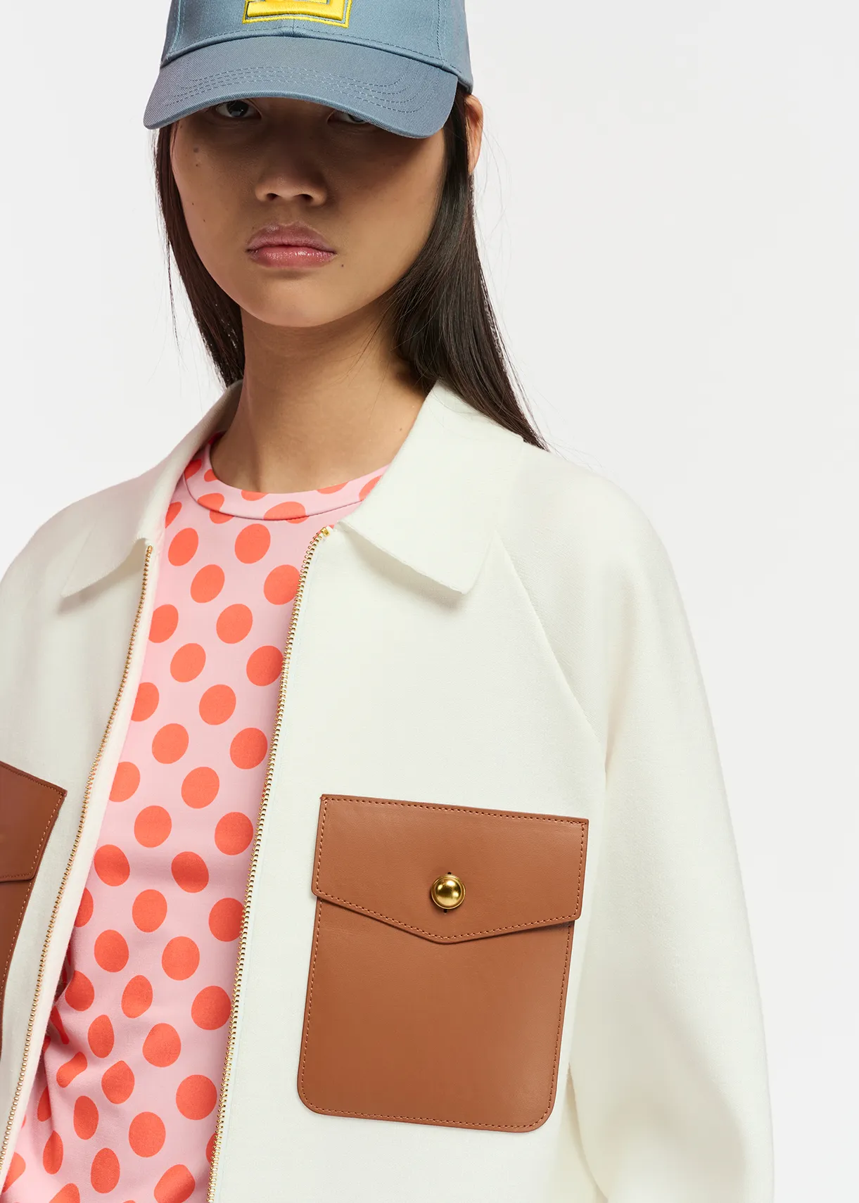 Off-white knitted jacket with faux leather patch pockets
