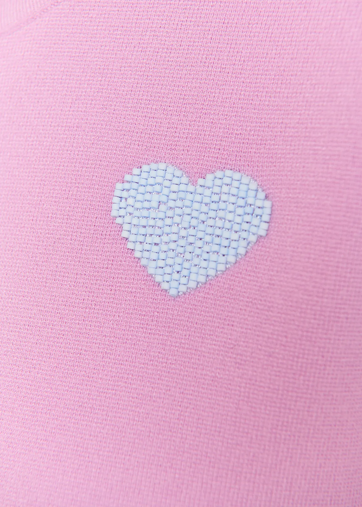 Lilac sleeveless knitted sweater with beaded embellishment