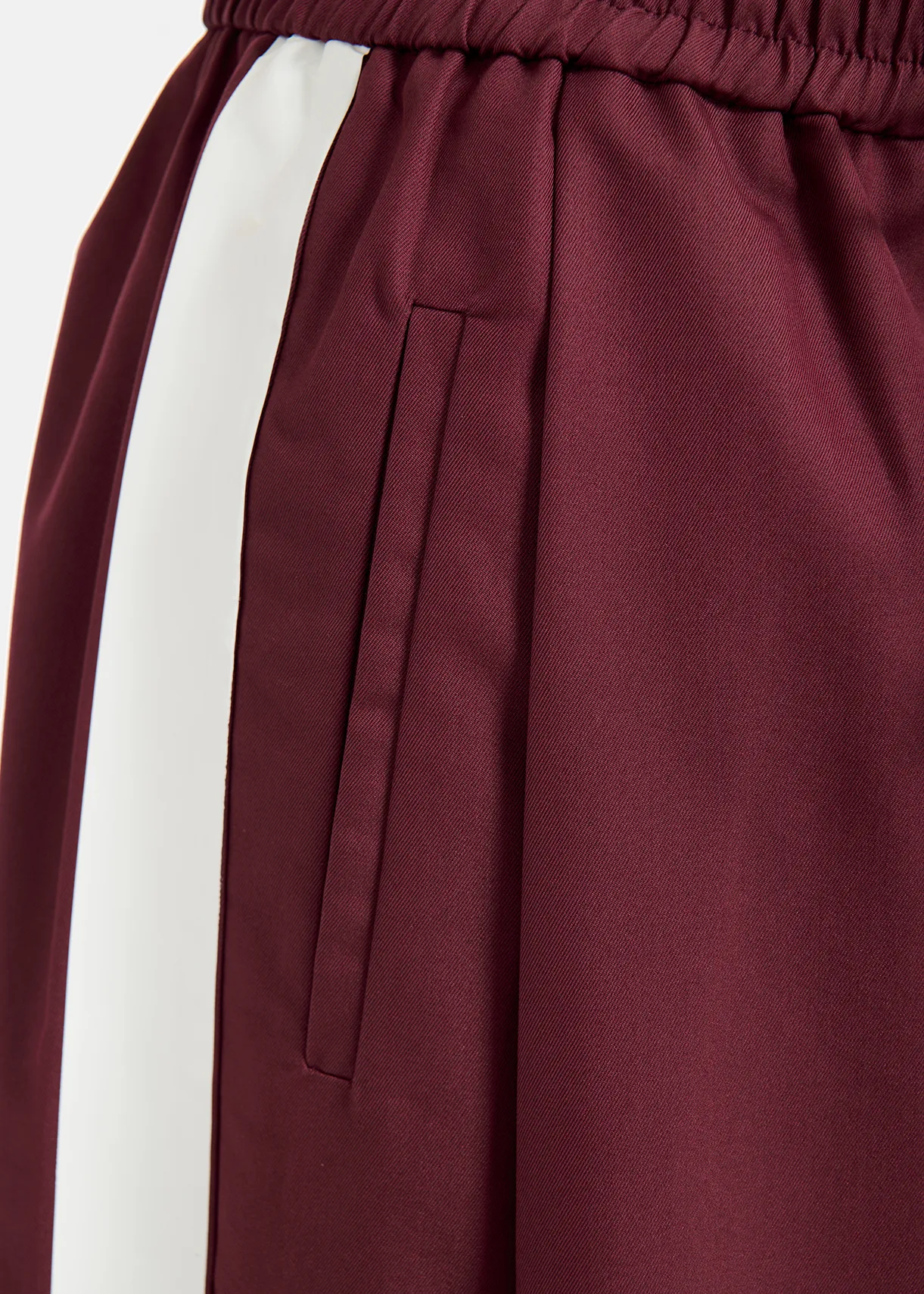 Burgundy wide-leg pants with white stripes