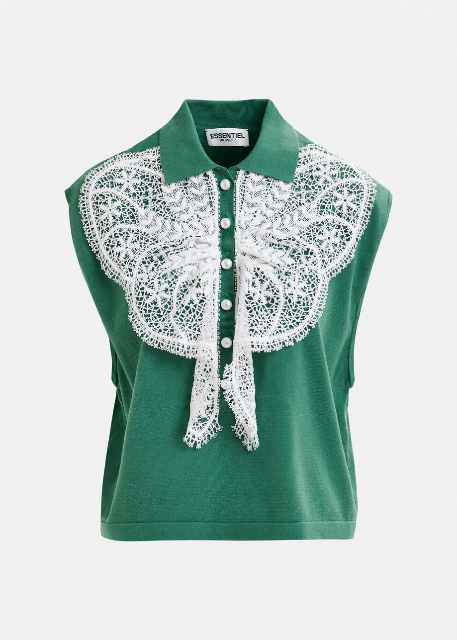 Witte mouwloze polo met kant en parelknopen