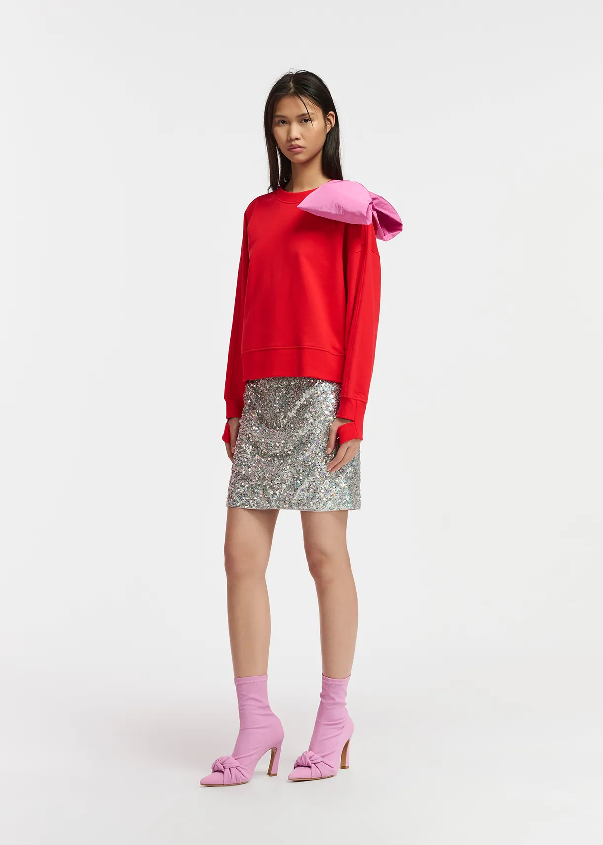 Red sweatshirt with pink bow