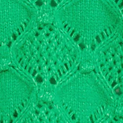 Green cable-knit turtleneck sweater