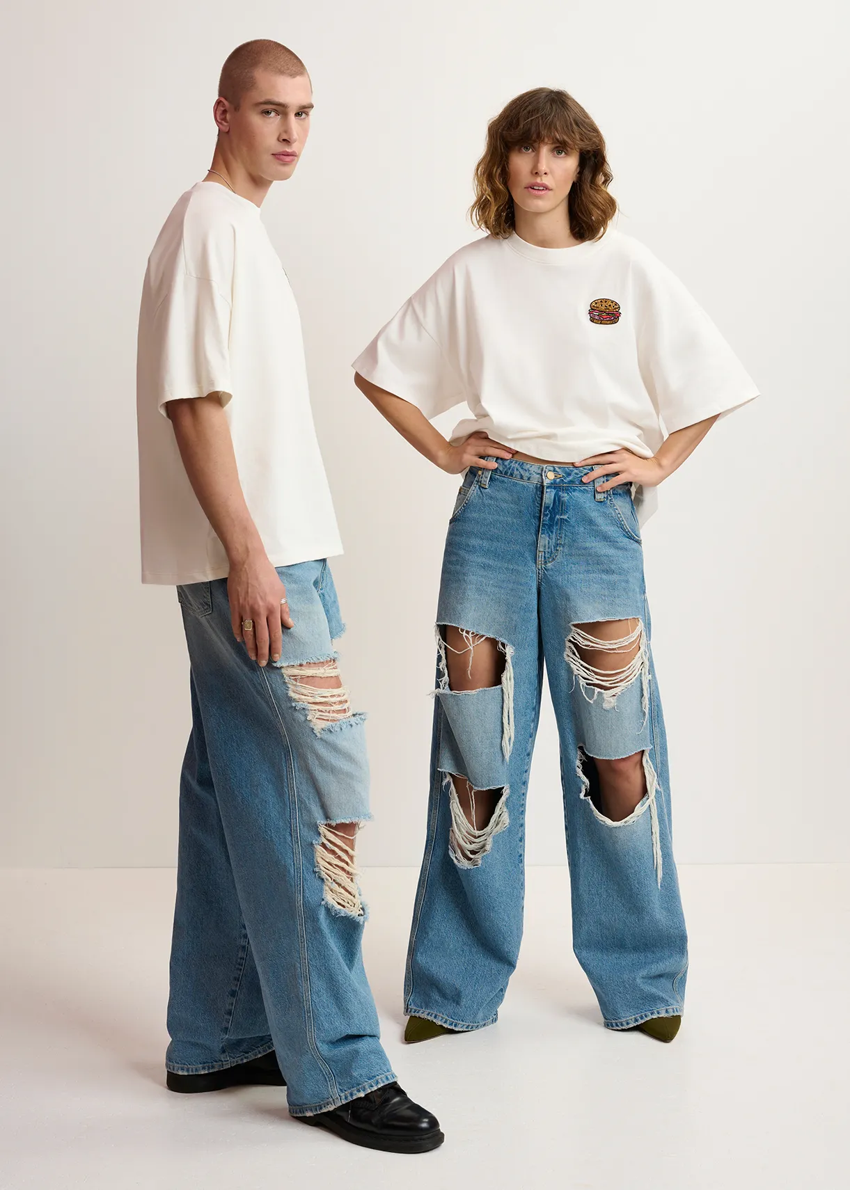 Distressed wide-leg blue jeans