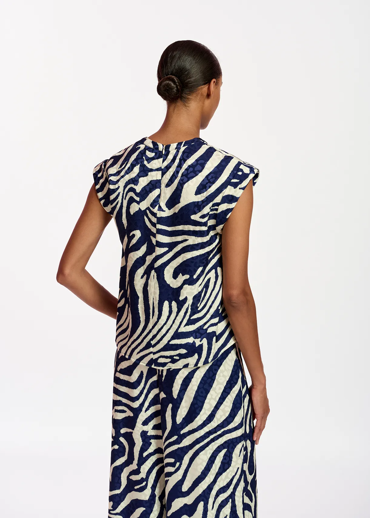 Navy blue and off-white zebra-print top
