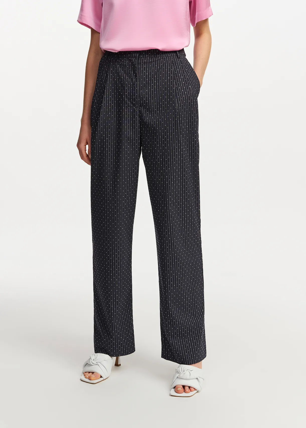 Navy blue pinstriped pants with rhinestone embellishments