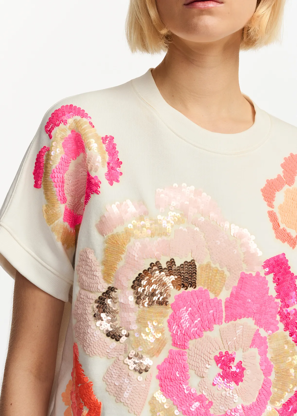 Off-white sleeveless sweatshirt with sequin embroideries