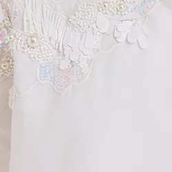 White cotton shirt with sequin and beaded embroideries