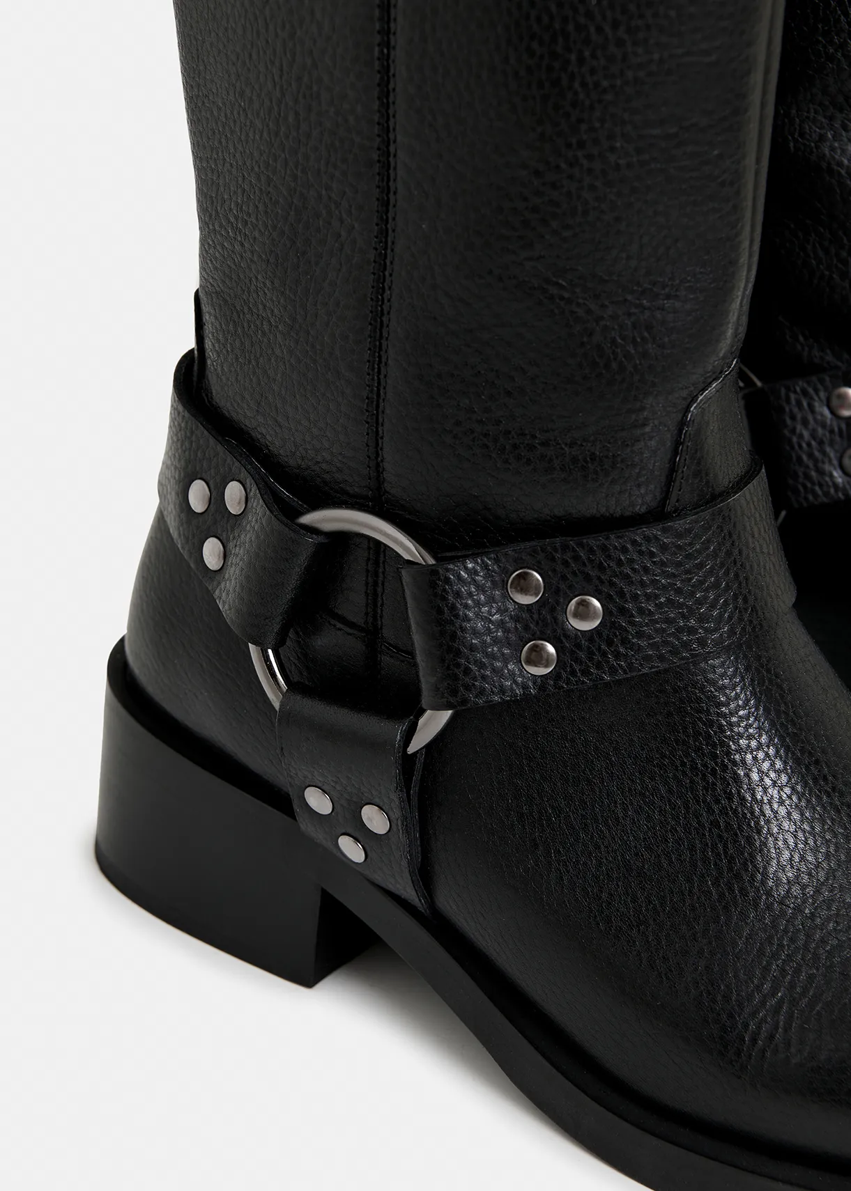 Black leather buckled boots