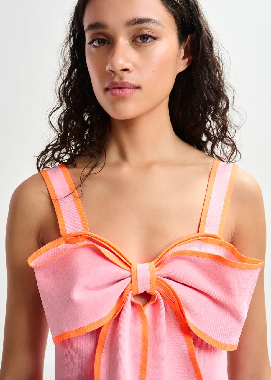 Black and white top with oversized bow and constrast trim