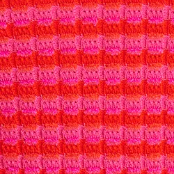 Pink and red striped knitted polo top