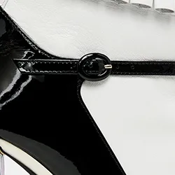 Black and white leather open-toe pumps