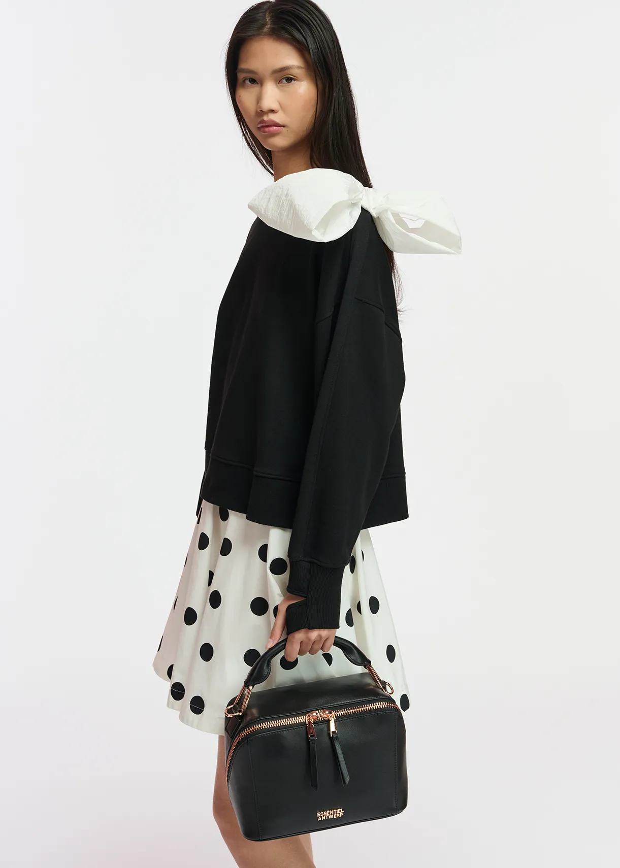 Black sweatshirt with white bow