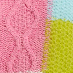 Ecru, lime green and pink cable-knitted patchwork sweater