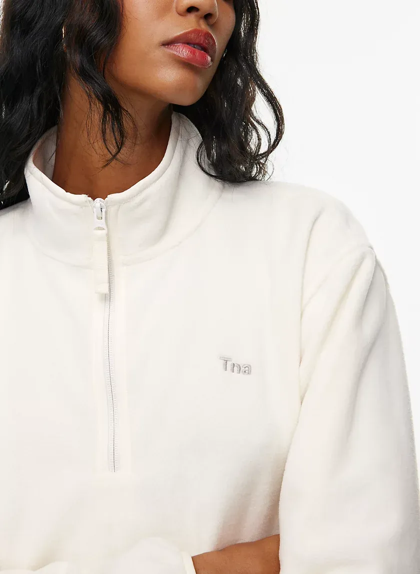 sno polar 1⁄4 zip hip sweater