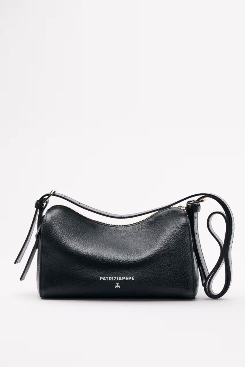 Camera Case Never Complete in pelle