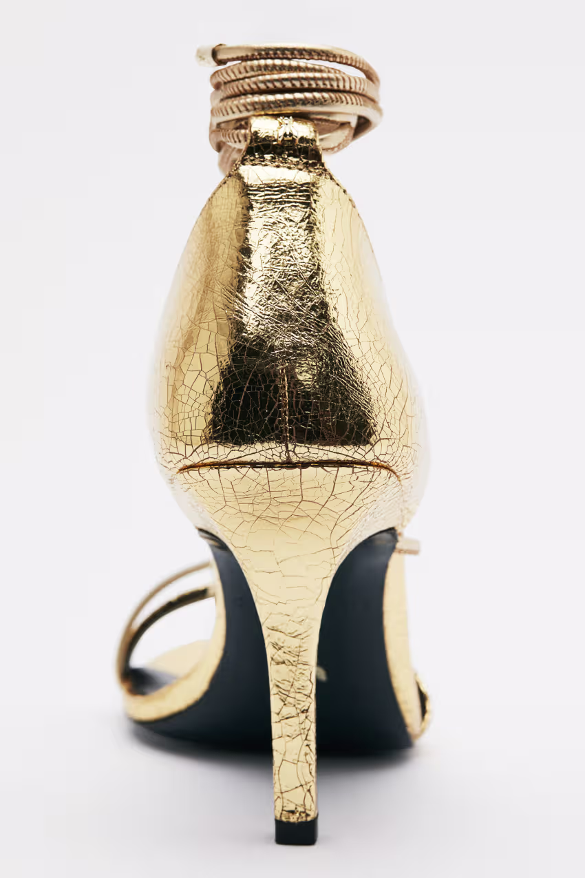 Sandali Minimal Shape in pelle laminata