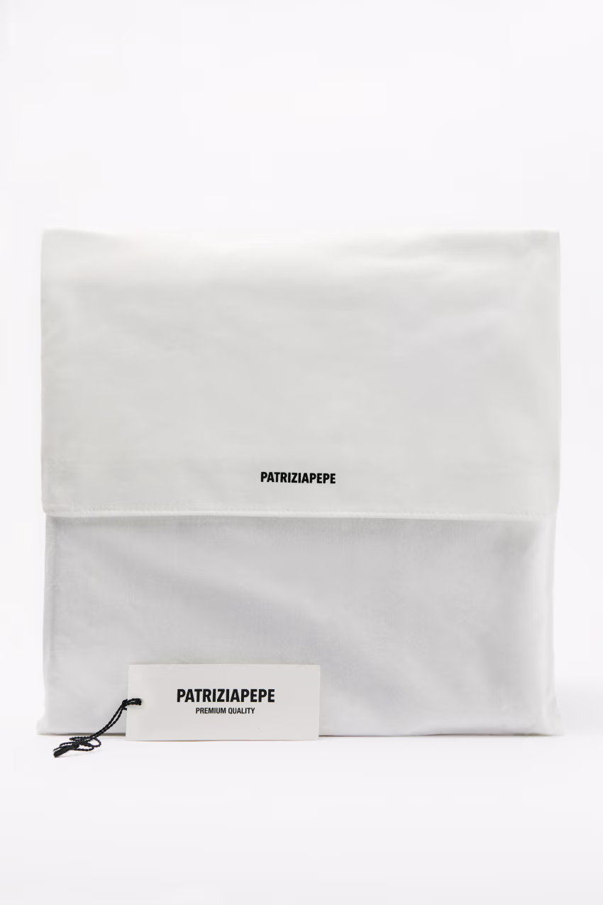 Poncho in cashmere con frange