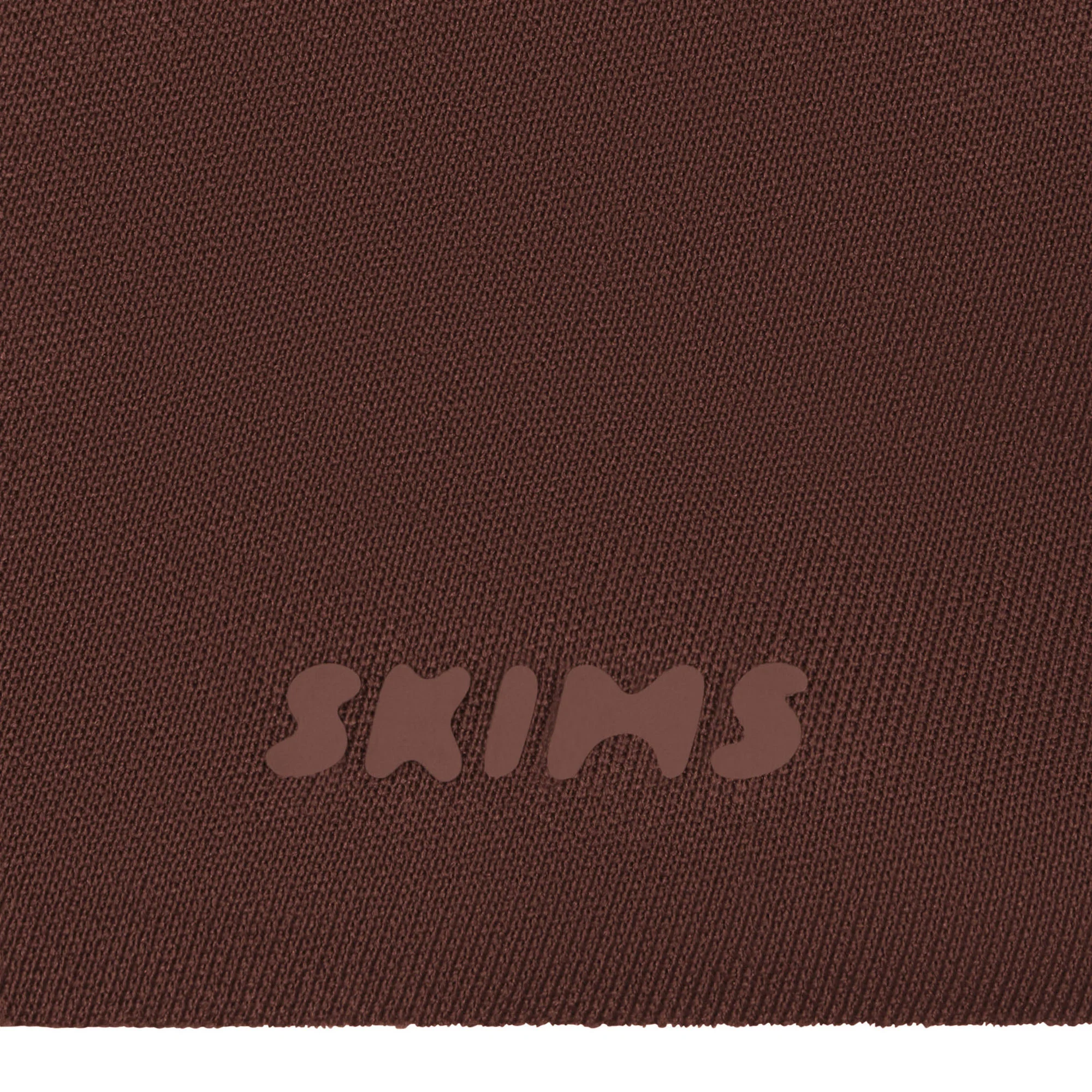 SKIMS ULTIMATE BODY PUSH-UP THONG BODYSUIT | ONYX