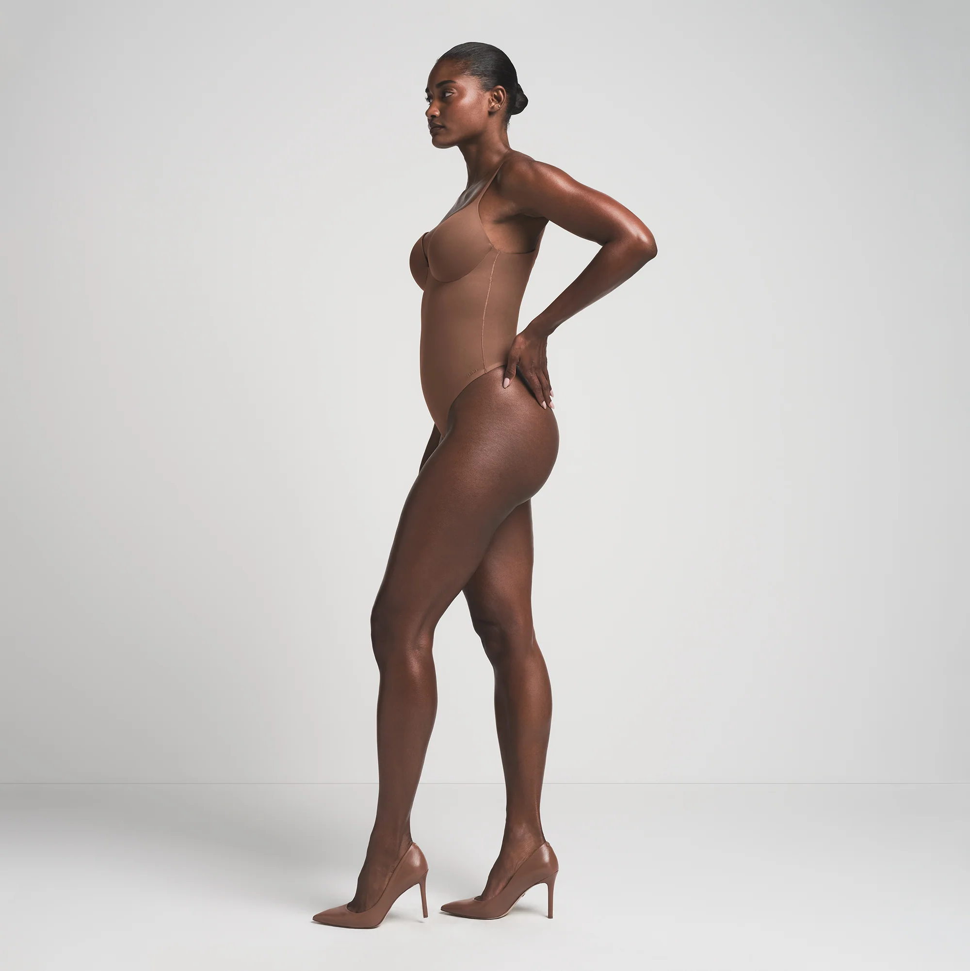 SKIMS ULTIMATE BODY PUSH-UP THONG BODYSUIT | ONYX