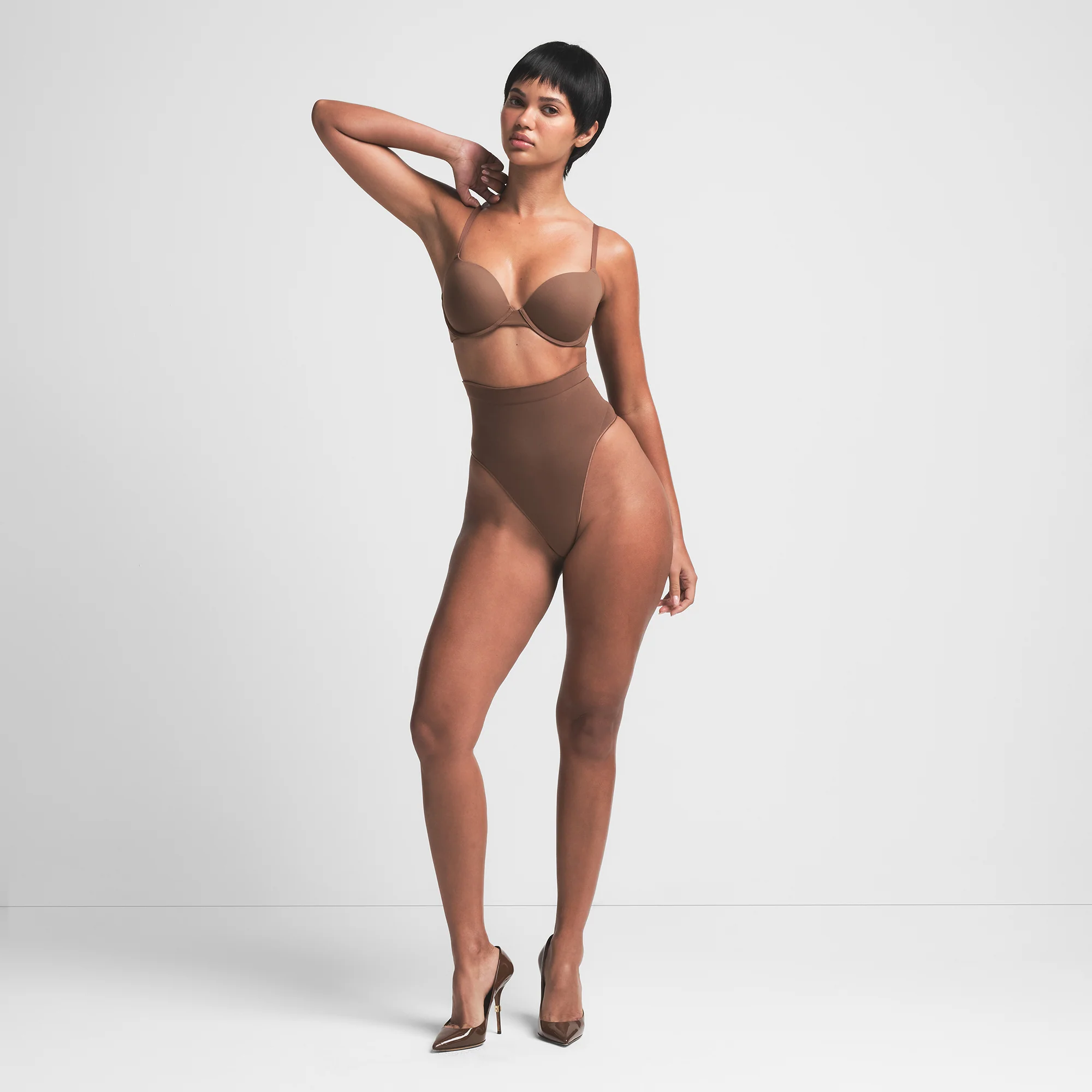 SEAMLESS SCULPT MID WAIST THONG | OCHRE