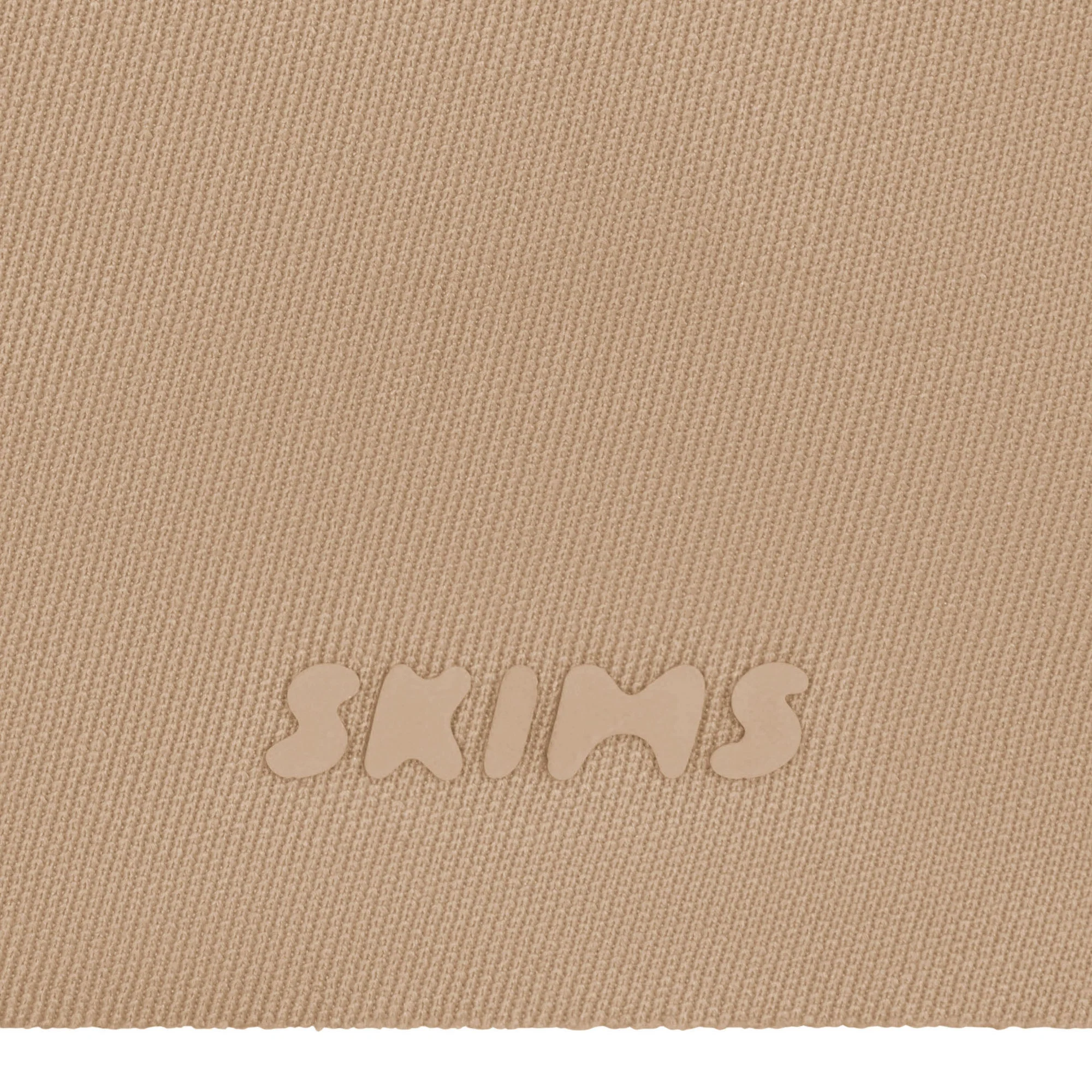 SKIMS ULTIMATE BODY PUSH-UP THONG BODYSUIT | ONYX