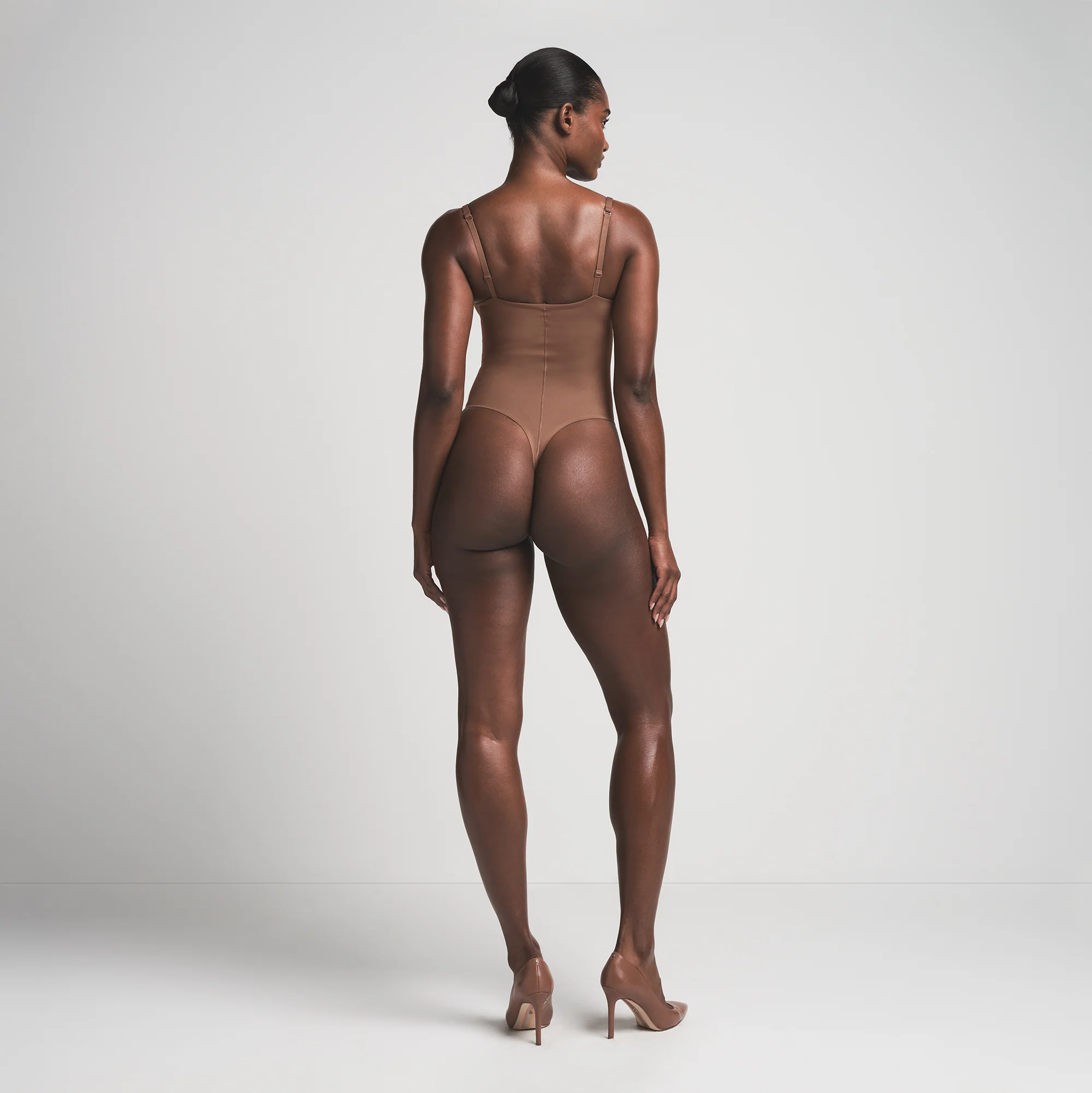 SKIMS ULTIMATE BODY PUSH-UP THONG BODYSUIT | ONYX