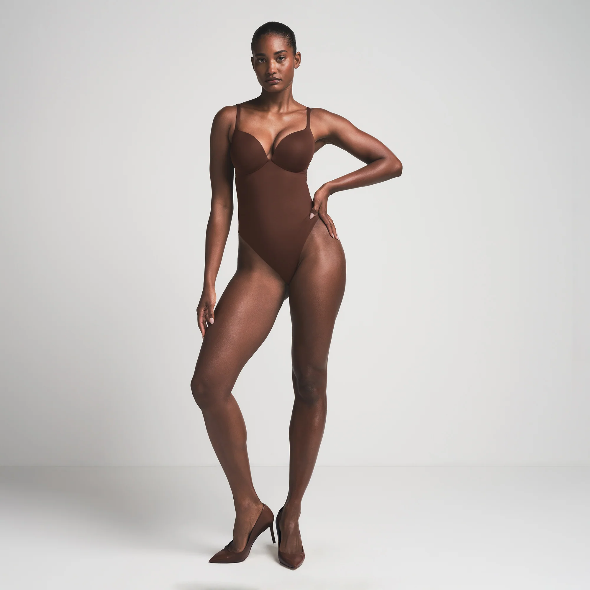 SKIMS ULTIMATE BODY PUSH-UP THONG BODYSUIT | ONYX
