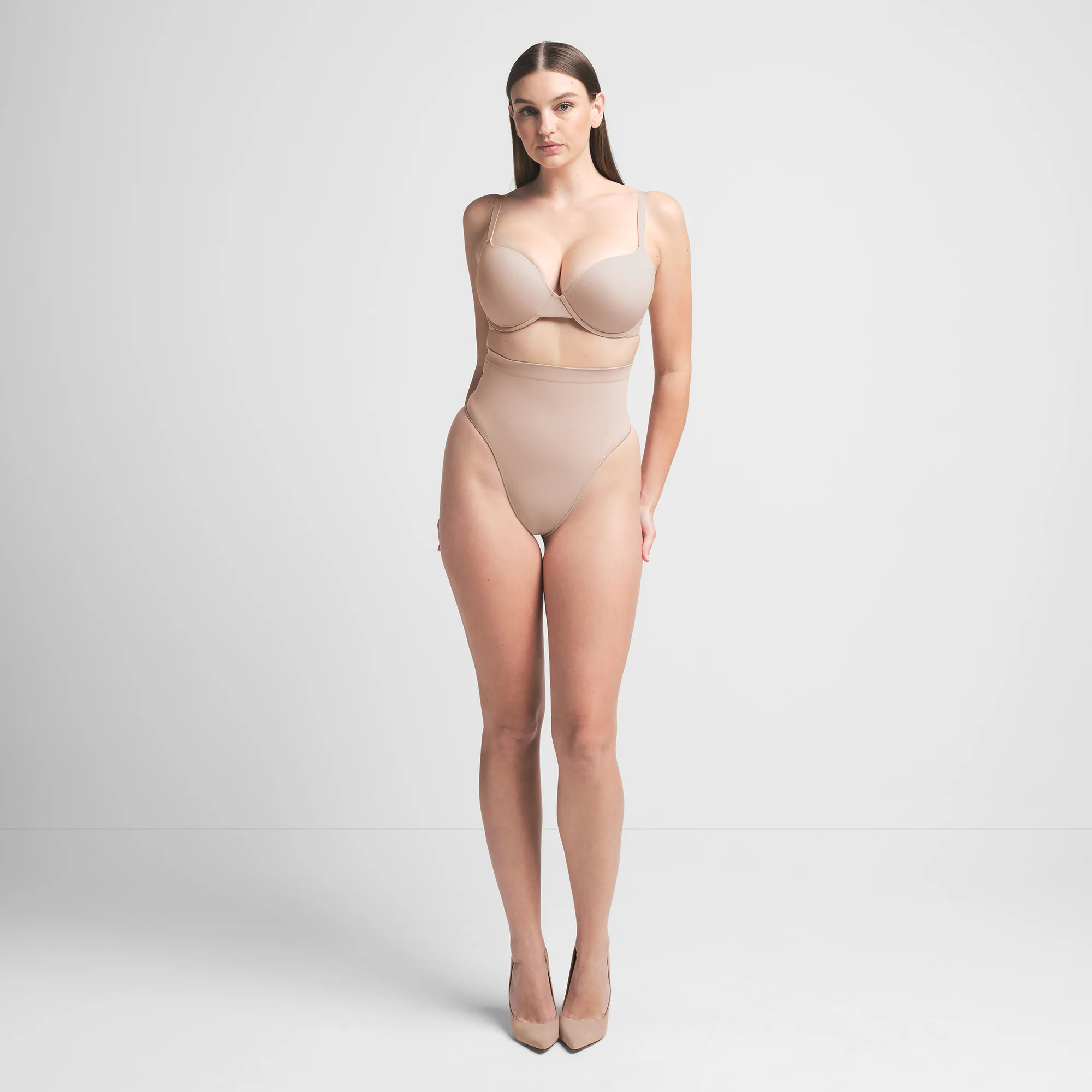 SEAMLESS SCULPT MID WAIST THONG | OCHRE